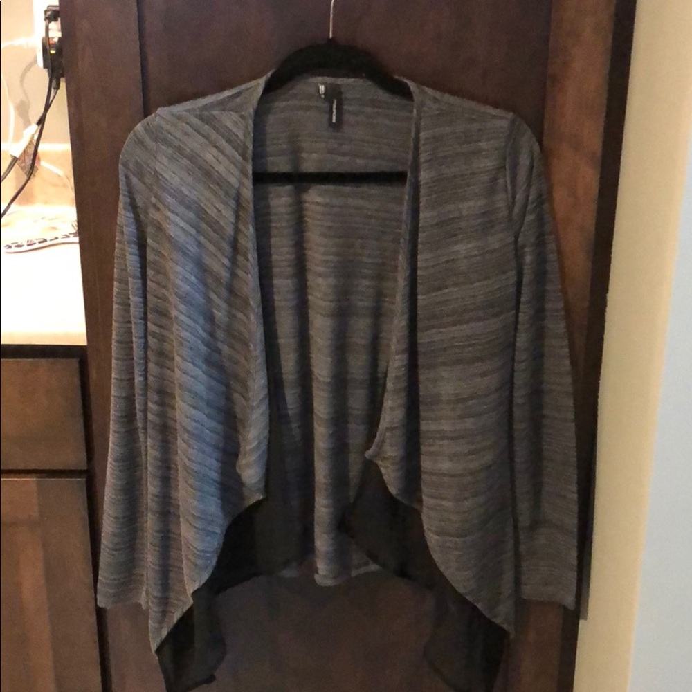 Maurice’s grey cardigan